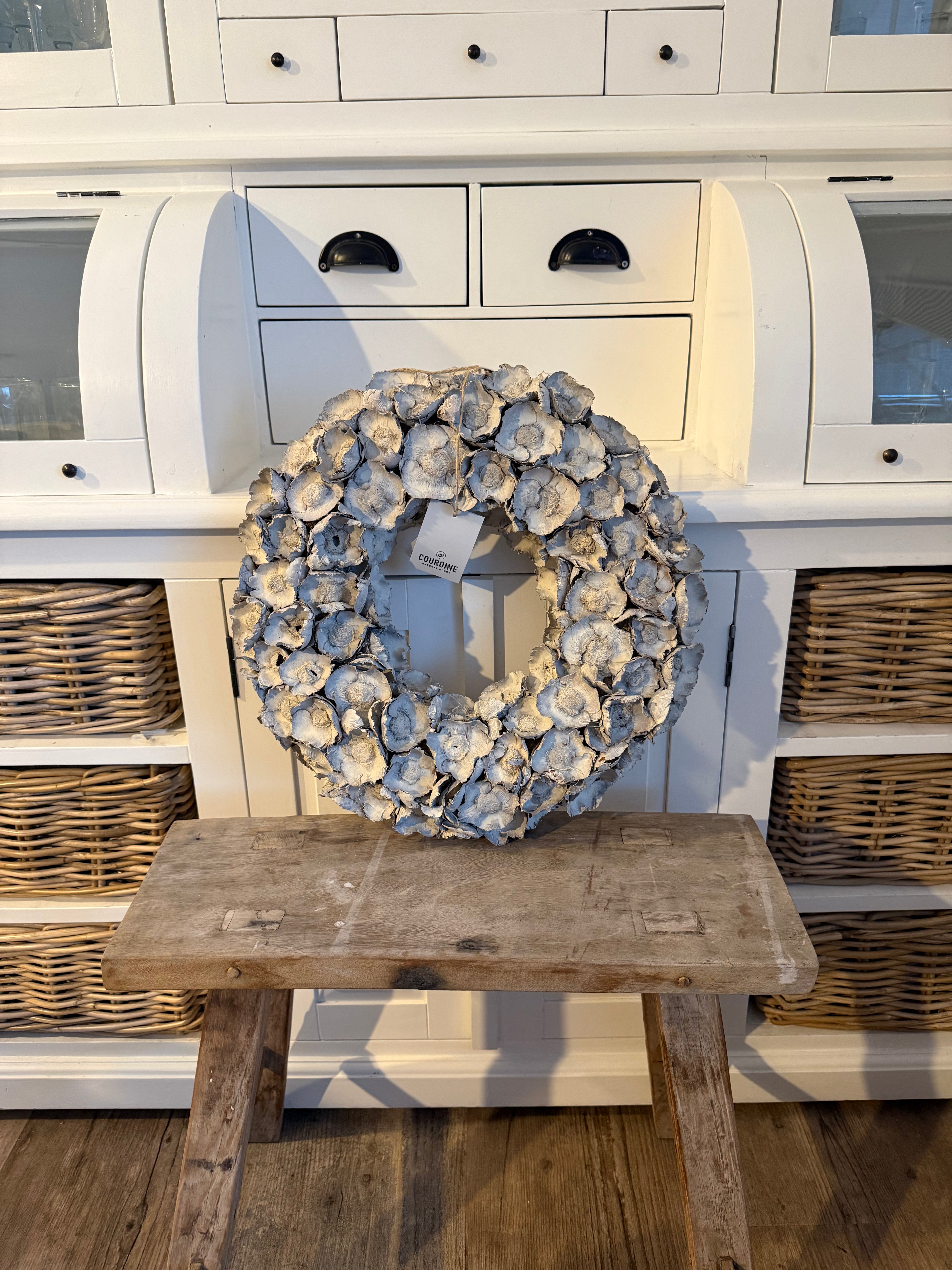 Kranz aus Kokosblumen Sandstone